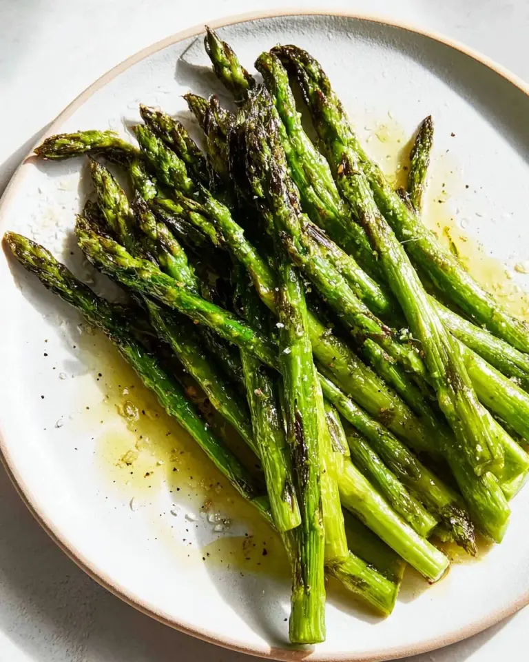 Delicious air fryer asparagus cooked to perfection in a healthy dish.