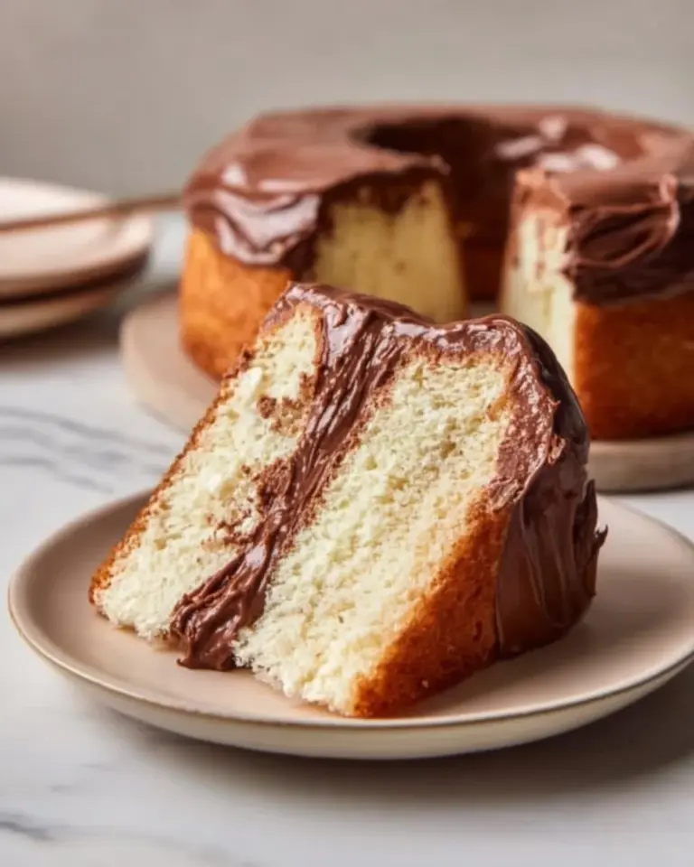 Delicious Nutella cake with creamy Nutella filling on a rustic wooden table
