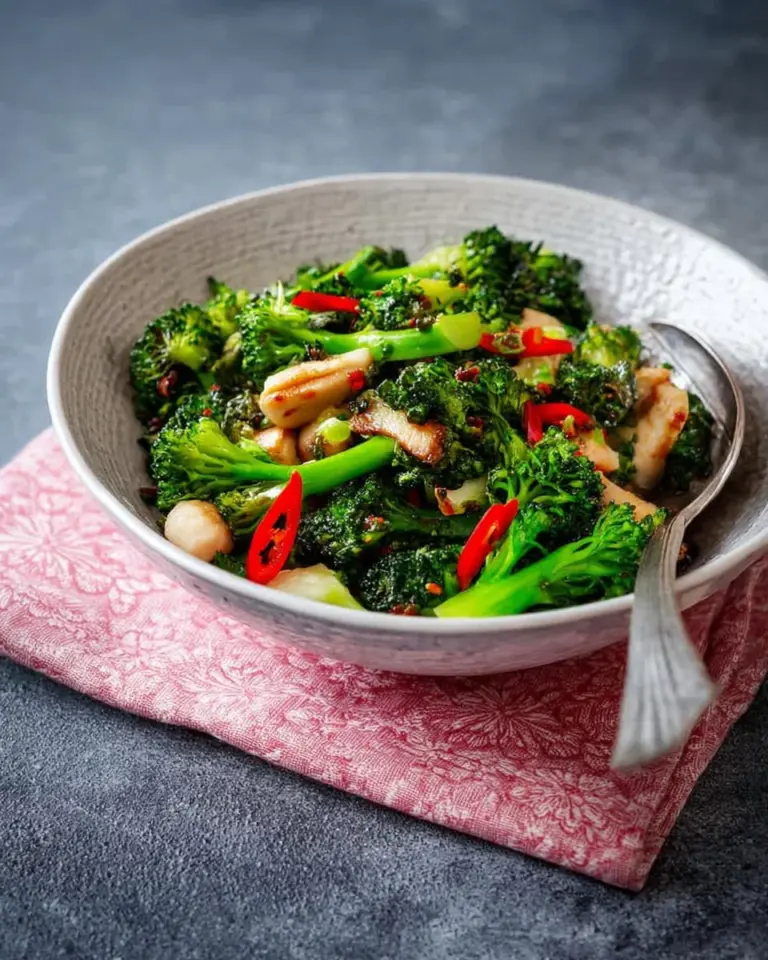 Broccoli stir fry with salted mackerel garnished with herbs