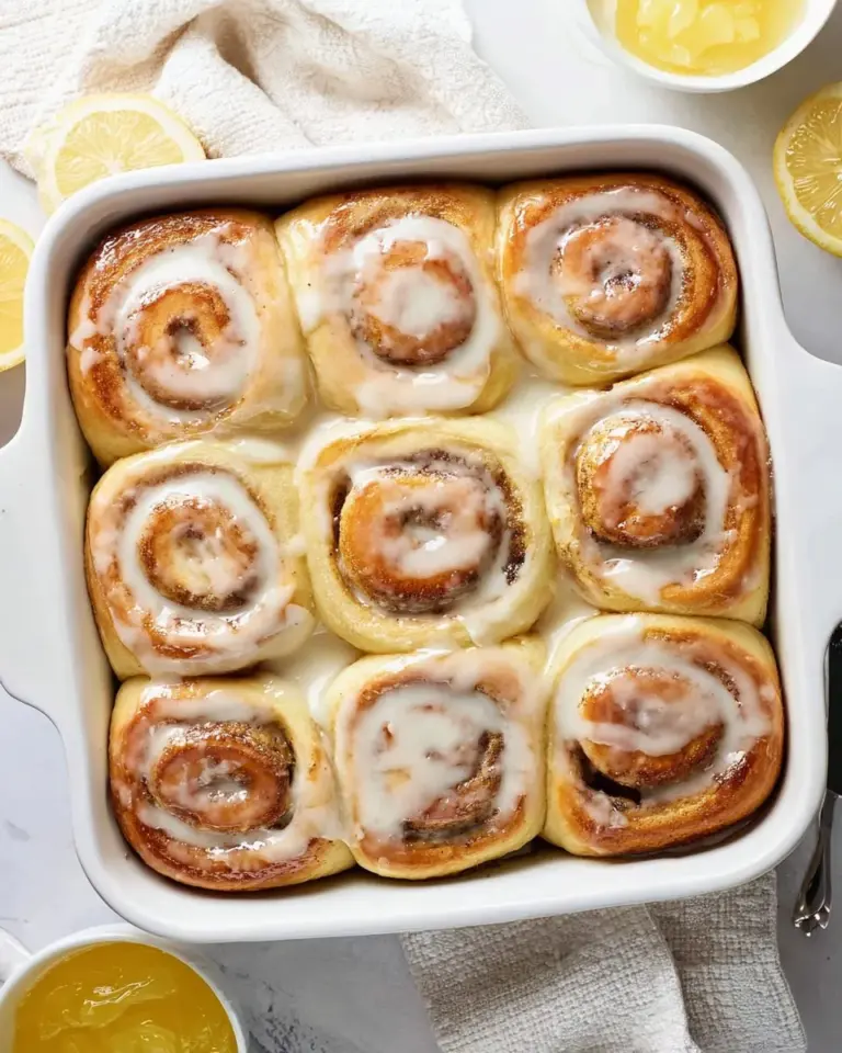 Freshly baked lemon poppy seed rolls with a golden crust and soft interior.