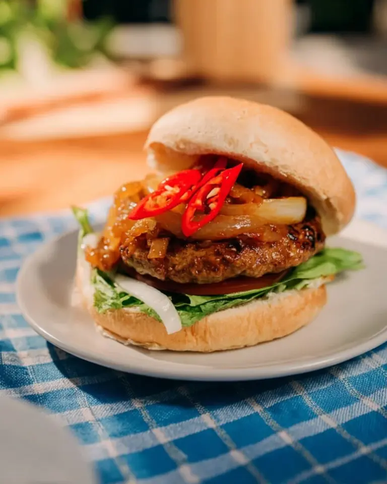 Massaman Curry Burger with rich flavors and vibrant toppings